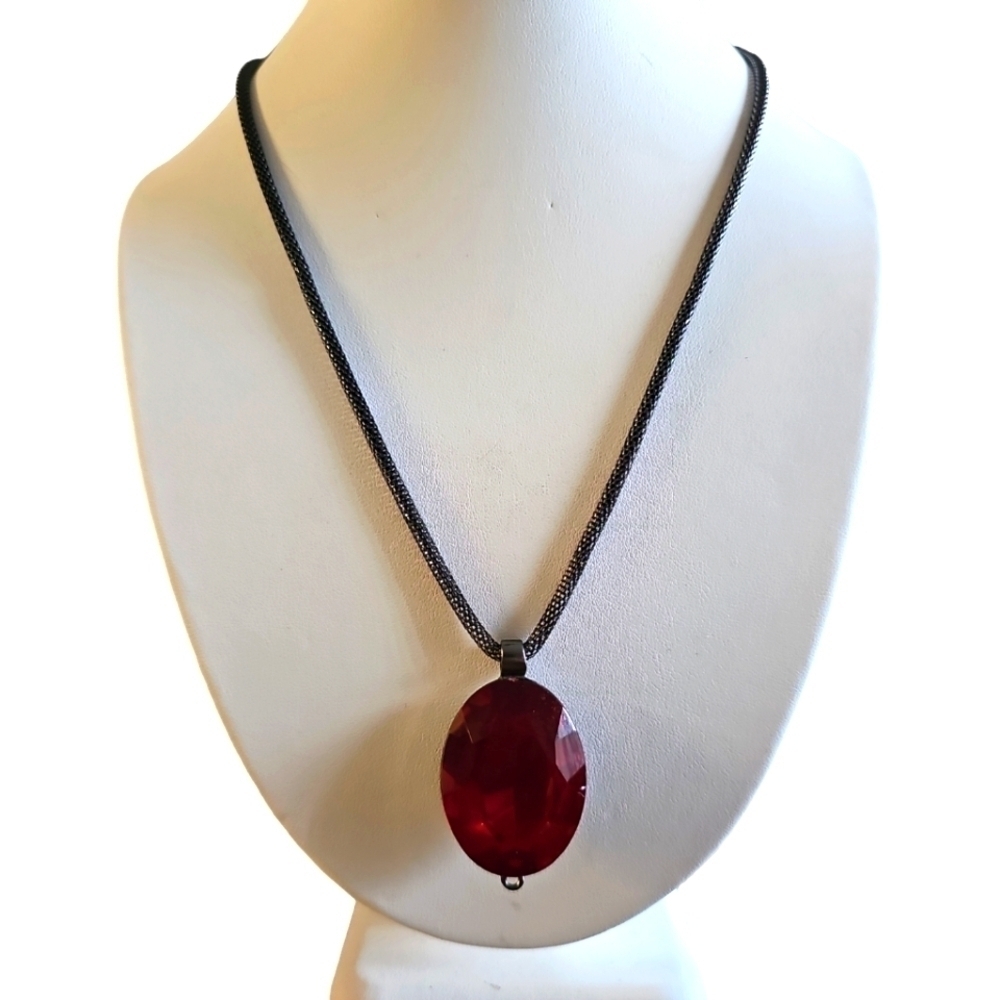 Long medallion style red pendant necklace